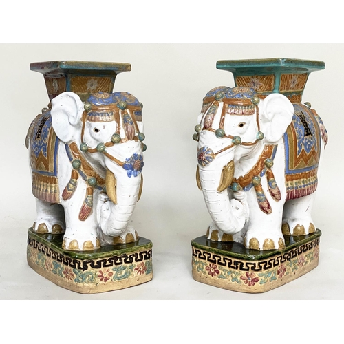 250 - ELEPHANT STOOLS, a pair, early 20th century Chinese ceramic white, green and blue in ceremonial atti... 