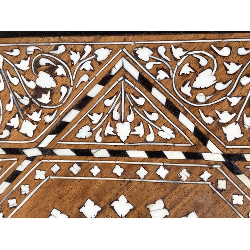 252 - HOSHIARPUR TABLE, 19th century North Indian octagonal hardwood and profusely bone inlaid with coform... 