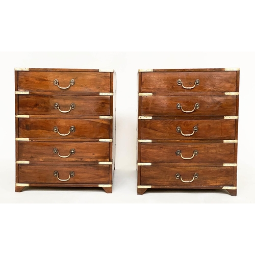 258 - CAMPAIGN CHESTS, a pair, antique Indian teak and brass bound bound each with five drawers, 45cm W x5... 