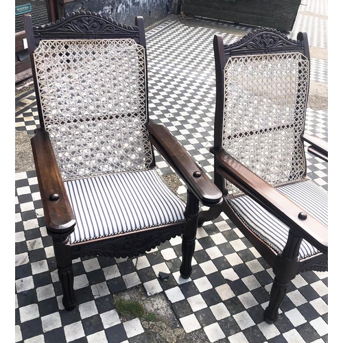 387 - PLANTERS CHAIRS, 100cm H , 65cm W, a pair, carved hardwood with string backs, padded ticking seats a... 