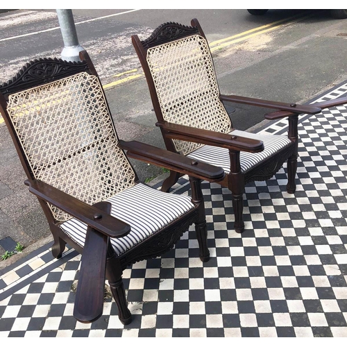 387 - PLANTERS CHAIRS, 100cm H , 65cm W, a pair, carved hardwood with string backs, padded ticking seats a... 