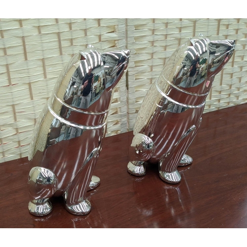 400 - POLAR BEAR COCKTAIL SHAKERS, a pair, polished metal, 27cm H. (2)