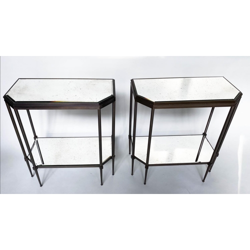 434 - CONSOLE TABLES, a pair, forged metal with two bevelled mirror shelves and canted front corners, 88cm... 