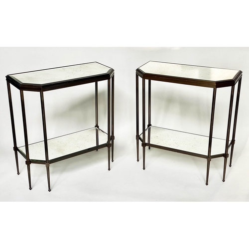 434 - CONSOLE TABLES, a pair, forged metal with two bevelled mirror shelves and canted front corners, 88cm... 