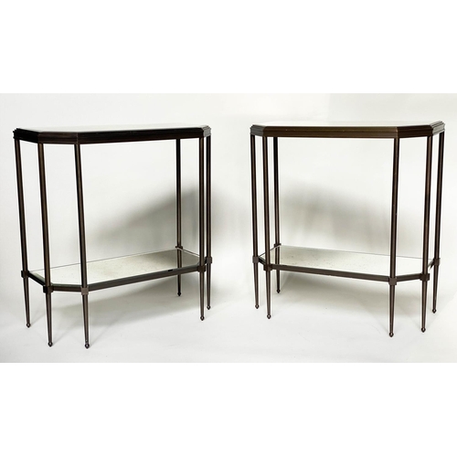 434 - CONSOLE TABLES, a pair, forged metal with two bevelled mirror shelves and canted front corners, 88cm... 