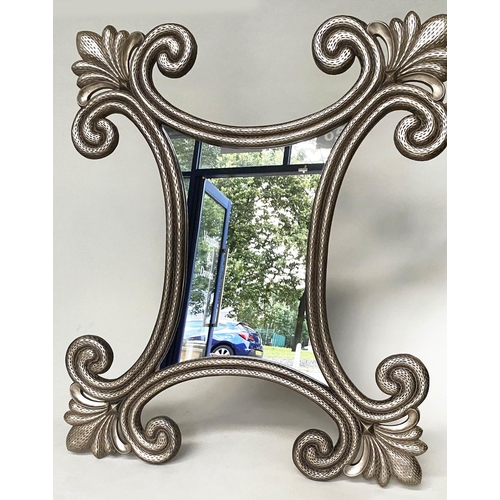 436 - WALL MIRROR, large textured silvered scrolling trefoil frame, 142cm W x 168cm H.