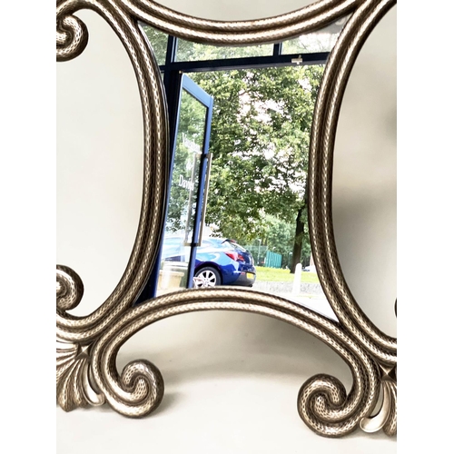 436 - WALL MIRROR, large textured silvered scrolling trefoil frame, 142cm W x 168cm H.