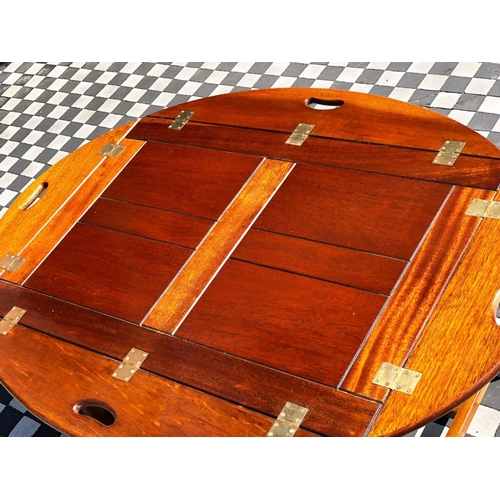 588 - BUTLERS TRAY TABLE, 55cm H x 120cm W 90cm D, Georgian style mahogany with hinged handled oval tray o... 