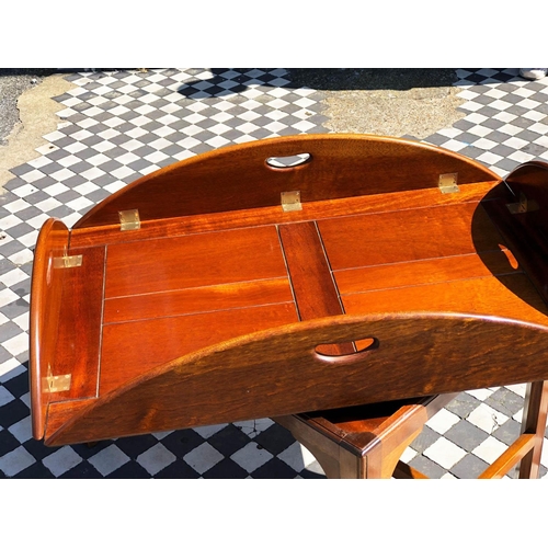 588 - BUTLERS TRAY TABLE, 55cm H x 120cm W 90cm D, Georgian style mahogany with hinged handled oval tray o... 