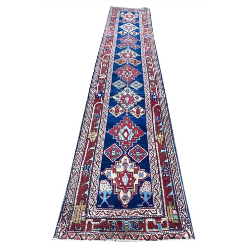 144A - ANTIQUE PERSIAN HERIZ RUNNER, 464cm x 82cm.