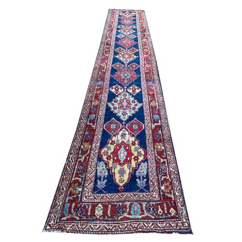 144A - ANTIQUE PERSIAN HERIZ RUNNER, 464cm x 82cm.