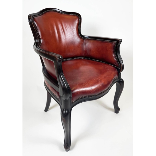 120 - BERGERE TUB ARMCHAIRS, a pair, in burgundy leather having shaped carved sinuous mahogany showframe w... 