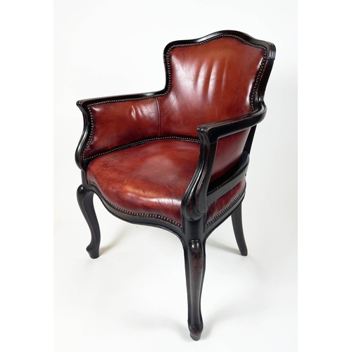 120 - BERGERE TUB ARMCHAIRS, a pair, in burgundy leather having shaped carved sinuous mahogany showframe w... 