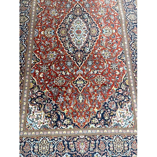 54 - KASHAN RUGS, a pair, 230cm x 144cm. (2)