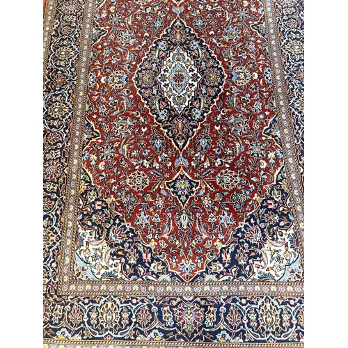 54 - KASHAN RUGS, a pair, 230cm x 144cm. (2)