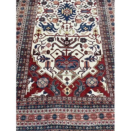 55 - ANTIQUE CAUCASIAN CARPET, 280cm x 163cm.