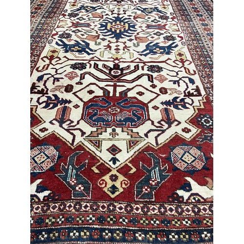 55 - ANTIQUE CAUCASIAN CARPET, 280cm x 163cm.