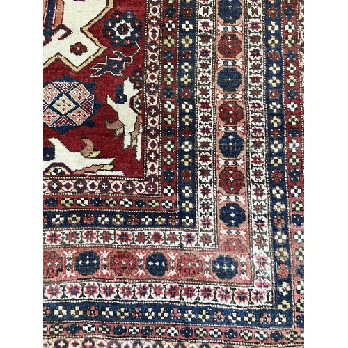 55 - ANTIQUE CAUCASIAN CARPET, 280cm x 163cm.