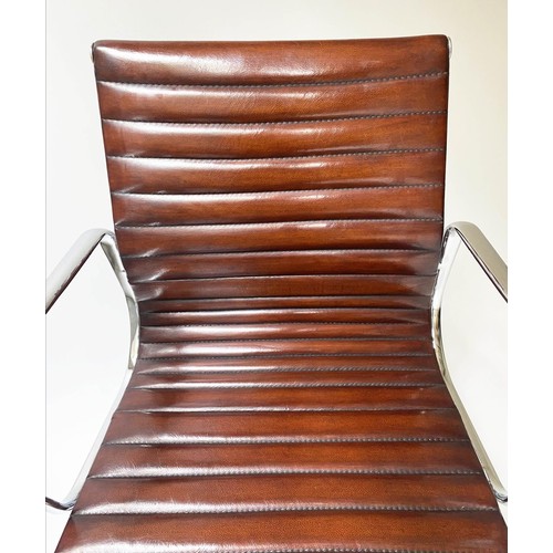 261 - REVOLVING DESK CHAIR, Charles and Ray Eames inspired with ribbed tan leather on an adjustable base w... 