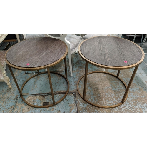 486 - PORTA ROMANA SIDE TABLES, a pair, each 68cm W x 62cm H, hammered metal frames with wooden tops. (2)