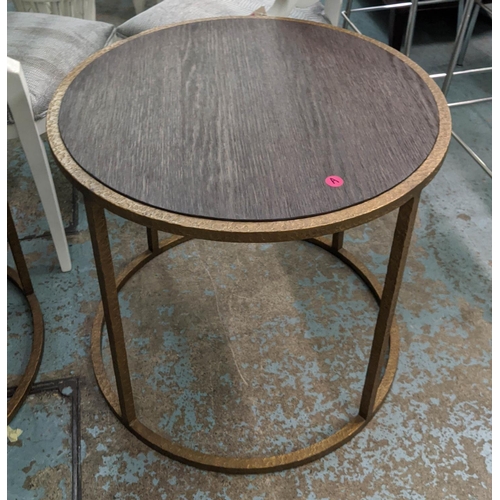 486 - PORTA ROMANA SIDE TABLES, a pair, each 68cm W x 62cm H, hammered metal frames with wooden tops. (2)