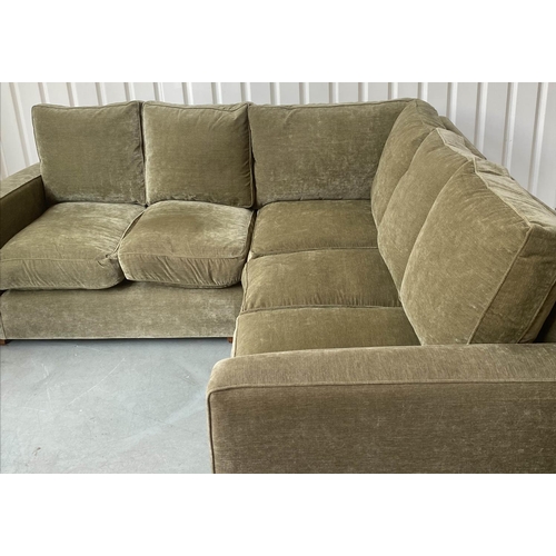 412 - CORNER SOFA, moss green velvet upholstered 254cm x 226cm.