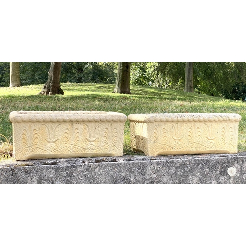 145 - WINDOW BOXES/PLANTERS, a pair, 54cm W x 20cm H x 30cm D, Cotswold stone style, with acanthus leaf de... 