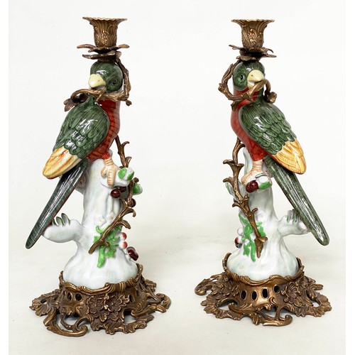 134 - PARROTT CANDLESTICKS, a pair, 36cm H, Continental style, painted porcelain, with gilt metal mounts. ... 