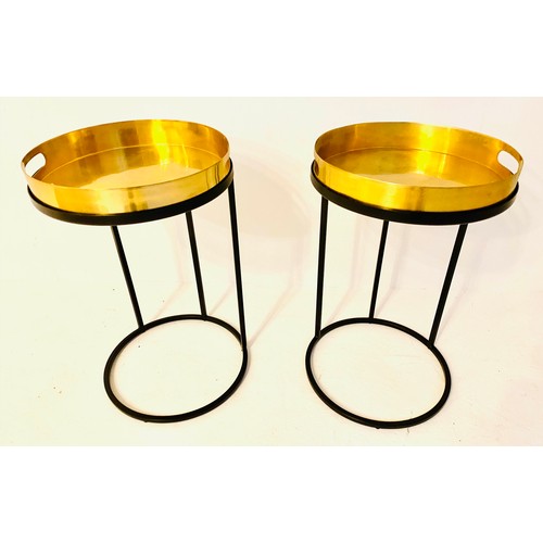 332 - SIDE TABLES, a pair, 50cm H x 42cm diam., gilt metal tray tops, on black metal supports. (2)