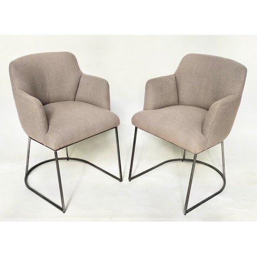 186 - ARMCHAIRS, a pair, with rounded backs and arms, grey upholstery and metal frames.