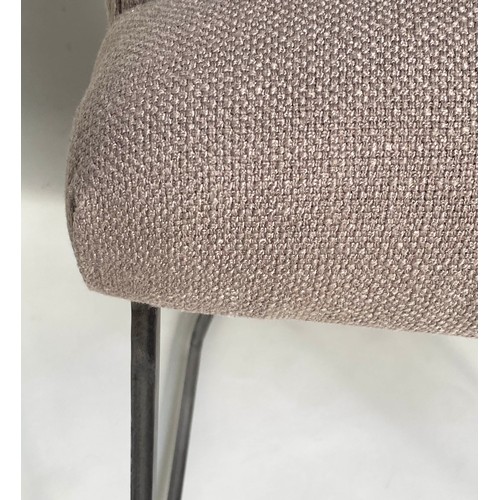 186 - ARMCHAIRS, a pair, with rounded backs and arms, grey upholstery and metal frames.