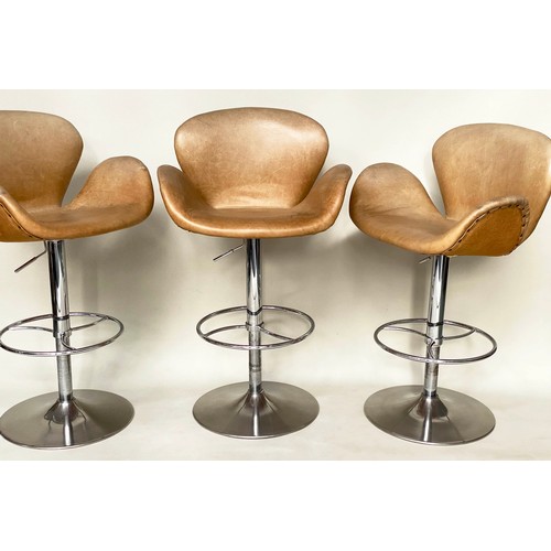 187 - ARTSOME PUMP STOOLS, a set of three, seat height 55cm to 82cm H, tan hide leather upholstered, heigh... 