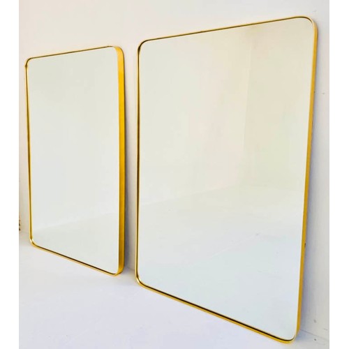 245 - WALL MIRRORS, a pair, 1960s French style, gilt framed, 121cm high x 80cm wide. (2)