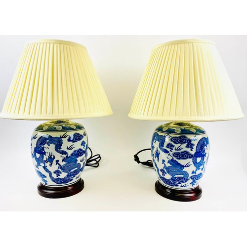 246 - TABLE LAMPS, a pair, 54cm H x 38cm diam., Export style, Chinese blue and white ceramic, with shades.... 