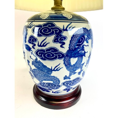 246 - TABLE LAMPS, a pair, 54cm H x 38cm diam., Export style, Chinese blue and white ceramic, with shades.... 