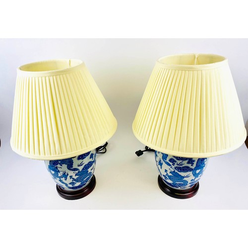 246 - TABLE LAMPS, a pair, 54cm H x 38cm diam., Export style, Chinese blue and white ceramic, with shades.... 