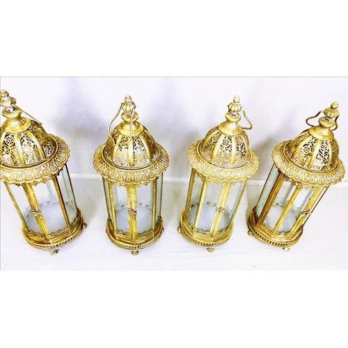 252 - LANTERNS, set of four, 61cm H x 21cm diam., Regency style, gilt metal frames (4)