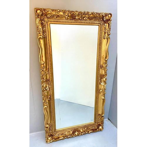 257 - WALL MIRROR, Continental style, gilt frame, 176cm H x 85cm W.