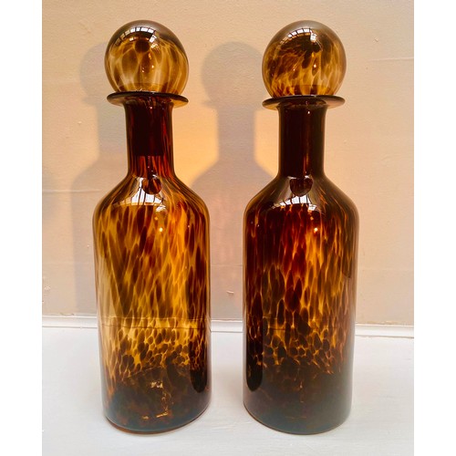 291 - DECANTERS, a pair, 53cm H x 14cm diam., Murano style tortoiseshell glass. (2)