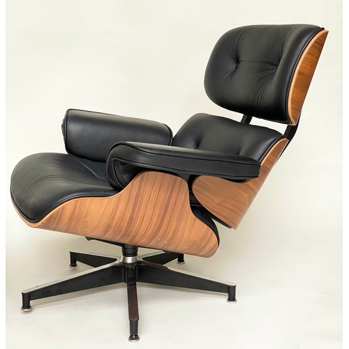 189 - LOUNGER ARMCHAIR AND STOOL, after Charles and Ray Eames, with buttoned black upholstery, with compan... 