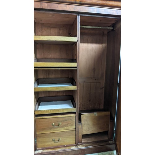 419 - WARDROBE, 132cm W x 208cm H x 57cm D Victorian walnut with two panelled doors enclosing sliding tray... 