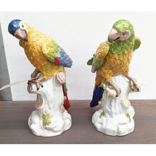 593 - SCUPTURAL PARROTS, a pair, 42cm H, glazed ceramic. (2)