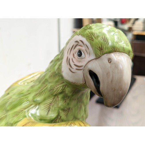 593 - SCUPTURAL PARROTS, a pair, 42cm H, glazed ceramic. (2)