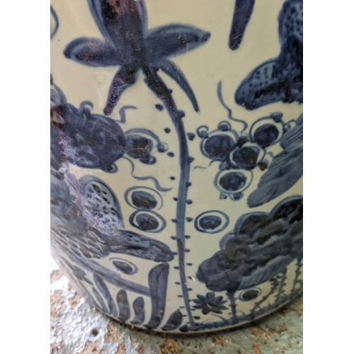 599 - PLANTERS, a pair, 50cm high, 48cm diameter, Chinese export style blue and white ceramic. (2)