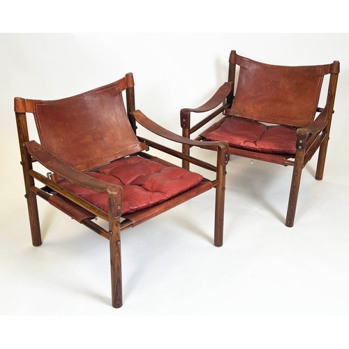 172 - SAFARI CHAIRS, a pair, 72cm H x 66cm W x 68cm D, 20th century rosewood and leather, after a design b... 