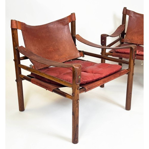 172 - SAFARI CHAIRS, a pair, 72cm H x 66cm W x 68cm D, 20th century rosewood and leather, after a design b... 