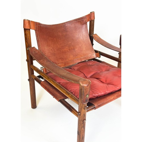 172 - SAFARI CHAIRS, a pair, 72cm H x 66cm W x 68cm D, 20th century rosewood and leather, after a design b... 