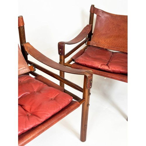 172 - SAFARI CHAIRS, a pair, 72cm H x 66cm W x 68cm D, 20th century rosewood and leather, after a design b... 