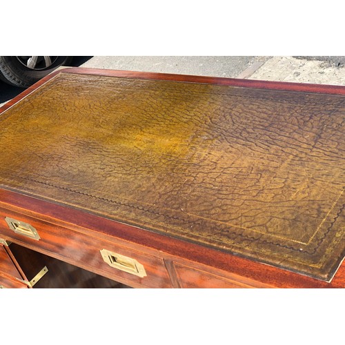 379 - CAMPAIGN STYLE PEDESTAL DESK, 78cm H x 122cm W x 60cm D, mahogany and brass bound, with green leathe... 