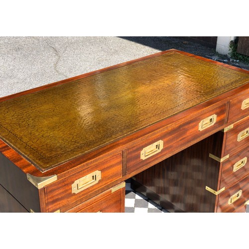 379 - CAMPAIGN STYLE PEDESTAL DESK, 78cm H x 122cm W x 60cm D, mahogany and brass bound, with green leathe... 